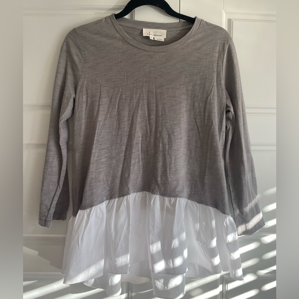Anthropologie peplum top. NWOT. Never worn. Size S.
